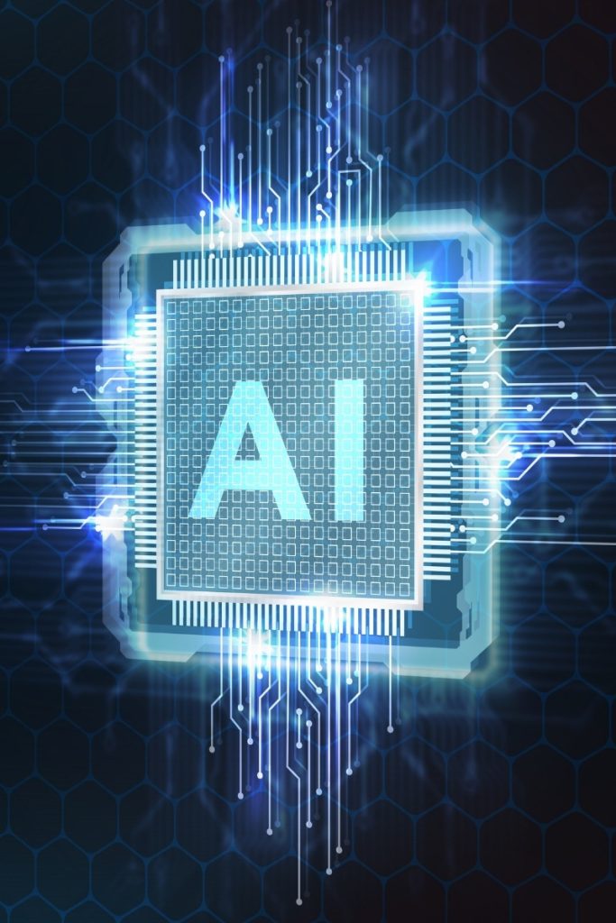 Computer processor marked AI and glowing